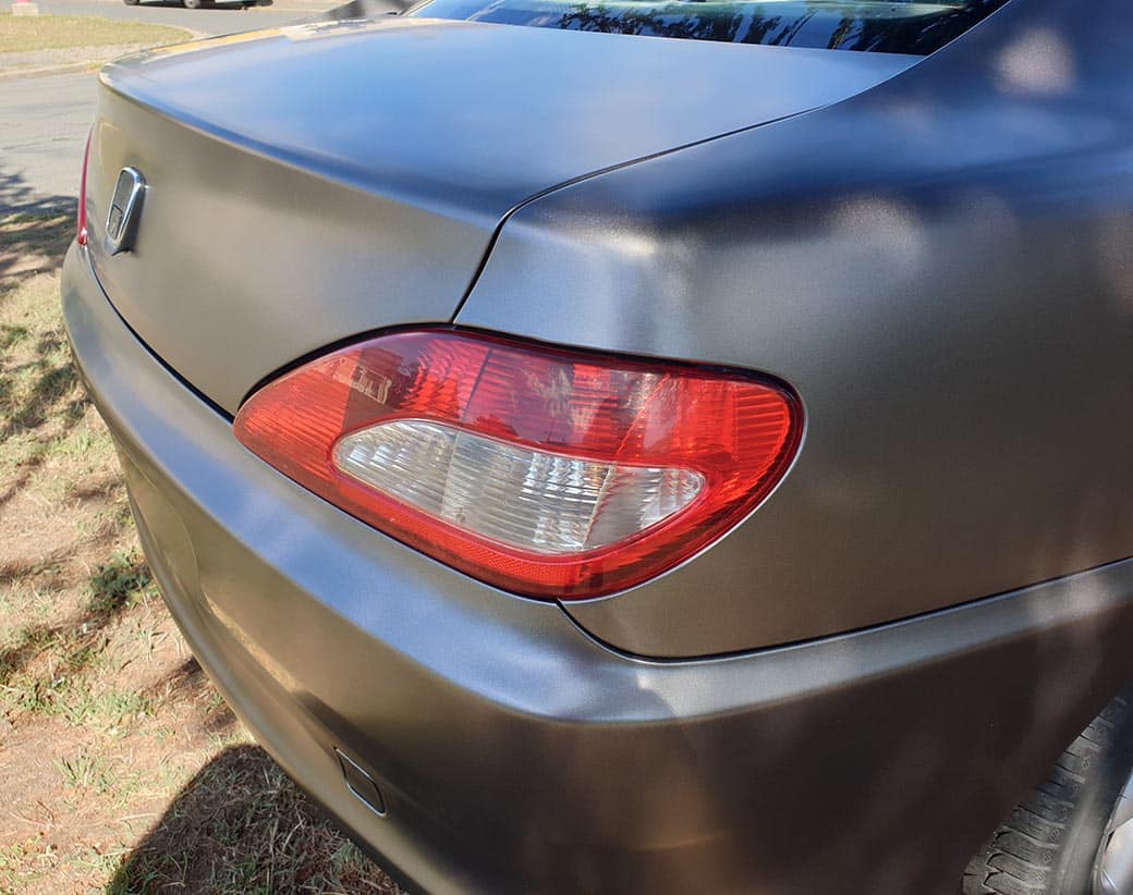 Peugeot 406 Coupe wrapped in 3M 2080 Satin Dark Grey vinyl.